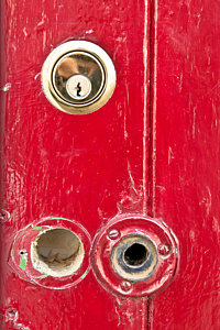 Wall Art - Photograph - Red Door Lock by Tom Gowanlock