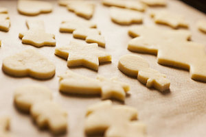 Wall Art - Photograph - Cookie Dough In Christmas Shapes by Cultura/Nils Hendrik Mueller