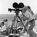 Photographers Filming An Event by Underwood Archives