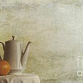 a jugful tea and a orange by Priska Wettstein