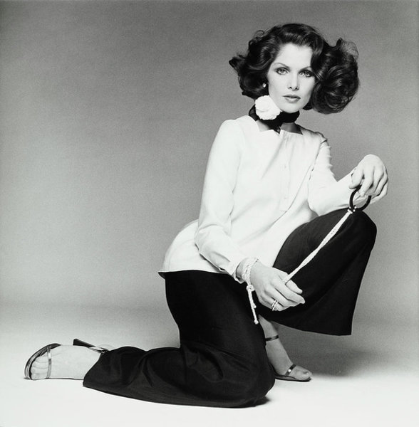 Wall Art - Photograph - Lois Chiles Wearing An Over-blouse And Pants by Francesco Scavullo