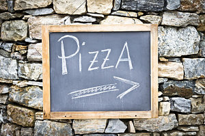 Wall Art - Photograph - Pizza Sign by Tom Gowanlock