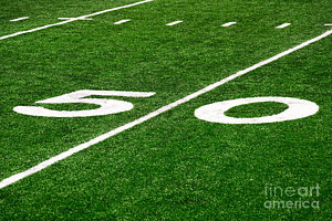 Football Wall Art - Photograph - 50 Yard Line On Football Field by Paul Velgos