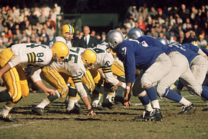 Football Wall Art - Photograph - Bart Starr Lines Them Up by Retro Images Archive