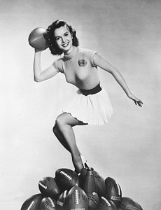 Football Wall Art - Photograph - Debbie Reynolds Throws A Pass by Underwood Archives