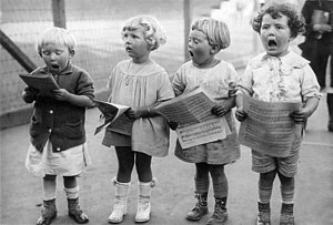 Wall Art - Photograph - Four Young Children Singing by Underwood Archives