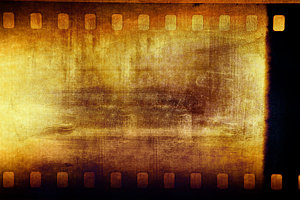 Wall Art - Photograph - Grunge Filmstrip by Les Cunliffe