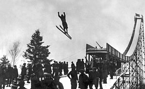 Wall Art - Photograph - Skier Off A Jump by Underwood Archives