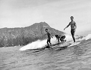 Wall Art - Photograph - Surfing In Honolulu by Underwood Archives